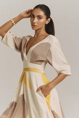 Elegant beige and yellow v-neck midi dress with pockets for women