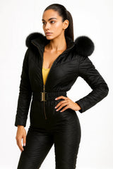 Women's black quilted jumpsuit with fur hood and gold belt – luxury winter fashion outfit