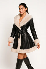 Women’s faux leather coat with beige faux fur trim – elegant belted winter jacket for stylish outfits