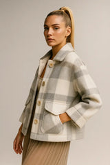 Damenes motefrakk i ullblanding med fuskepels