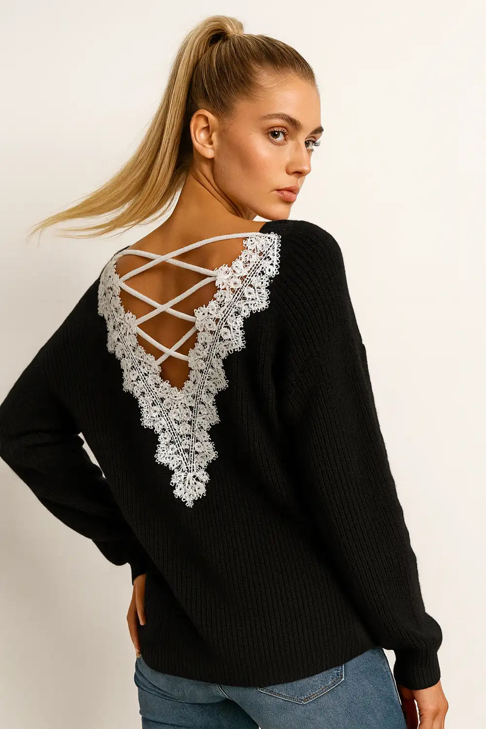 Women’s black knit sweater with white lace-back detail – elegant open-back top